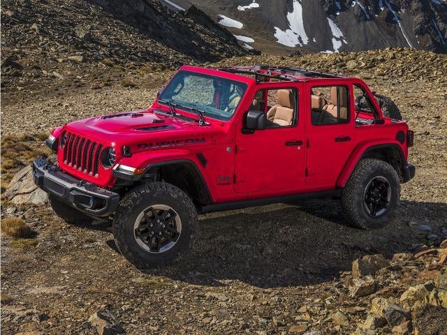 2021 Jeep Wrangler Unlimited Sahara 4x4 in Snazzberry Pearlcoat — front three-quarter view