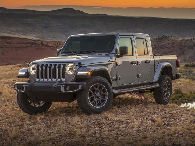 2022 Jeep Gladiator Willys Sport 4x4 in Sting Gray Clearcoat — front three-quarter view