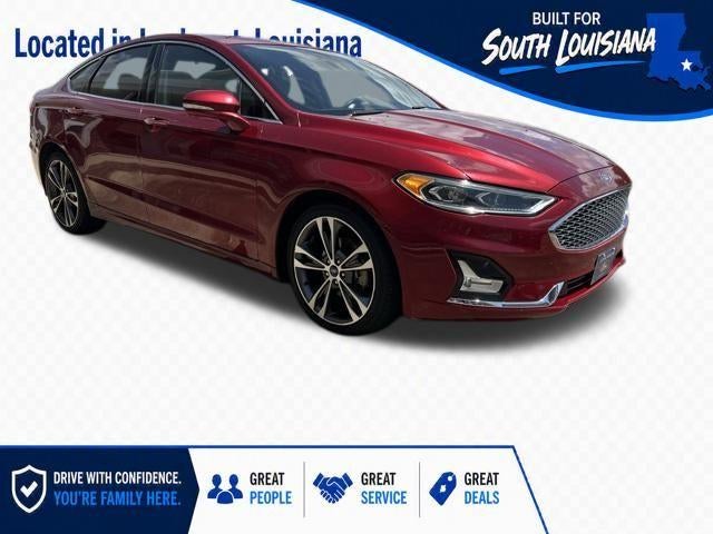 2019 Ford Fusion Titanium AWD in Ruby Red Metallic Tinted Clearcoat — front three-quarter view