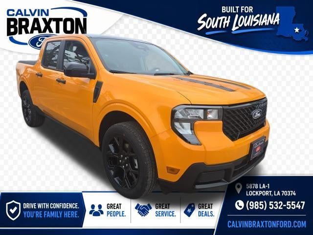 2026 Ford Maverick XLT AWD SuperCrew in Orange Fury Metallic Tri Coat — front three-quarter view